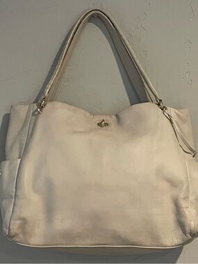 Elegant Henri Bendel Cream Leather Tote with Turn-Lock hardware needs some TLC!!